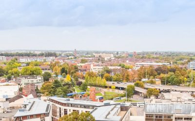 City view A cityscapewqith commercial, residential buildings with some trees.